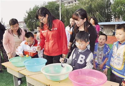 金胶州数字报-特教中心:无声世界谱写大爱音符