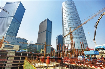 渝中报数字报-嘉陵帆影18根钢管柱承载120万吨